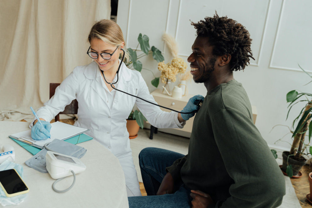 Doctor with patient on Medical Aid